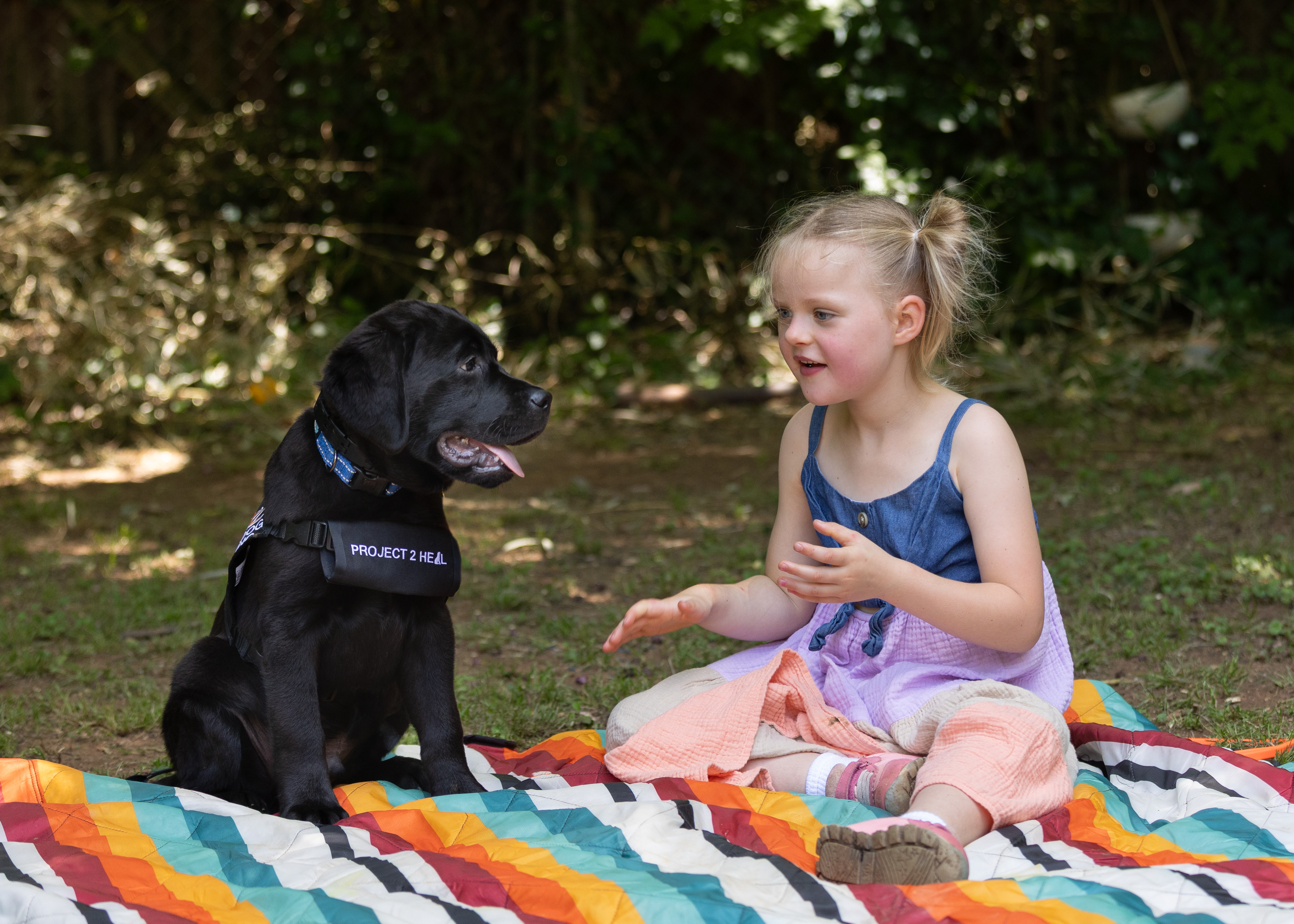 Hand-in-Paw: How One Little Girl is Inspiring a Movement of Hope